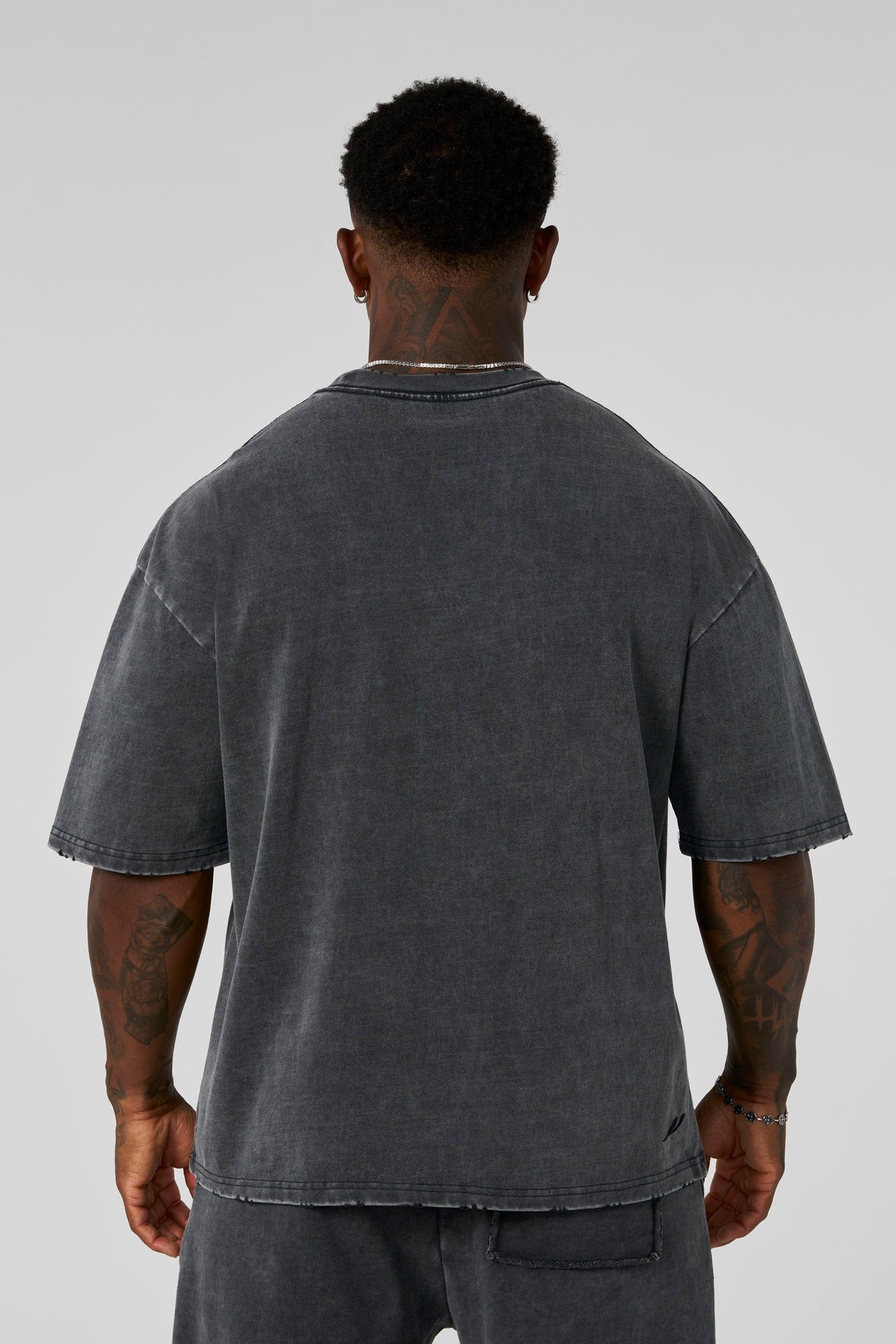 4153 - Elevated Essentials - Relaxed Tee - Oversized heavyweight cotton tee with drop shoulders, natural drape, and subtle 'Elevated' detailing in colour Grey Wash.