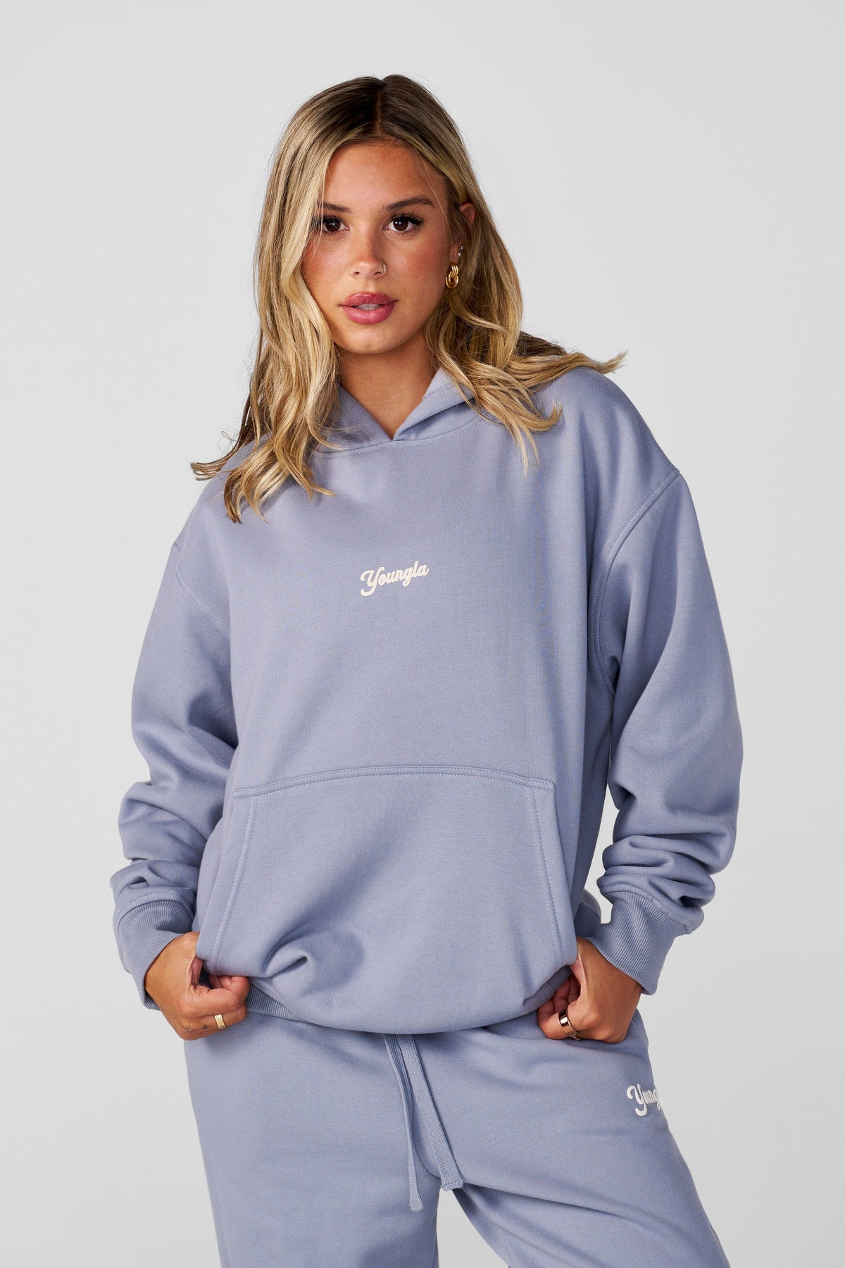 W566 Soft Serve Hoodie- Oversized fluffy fleece hoodie with a fun puff print, offering ultra-soft comfort and cozy style—perfect for pairing with the W271 Puff Print Cuffed Jogger in Dusty Blue