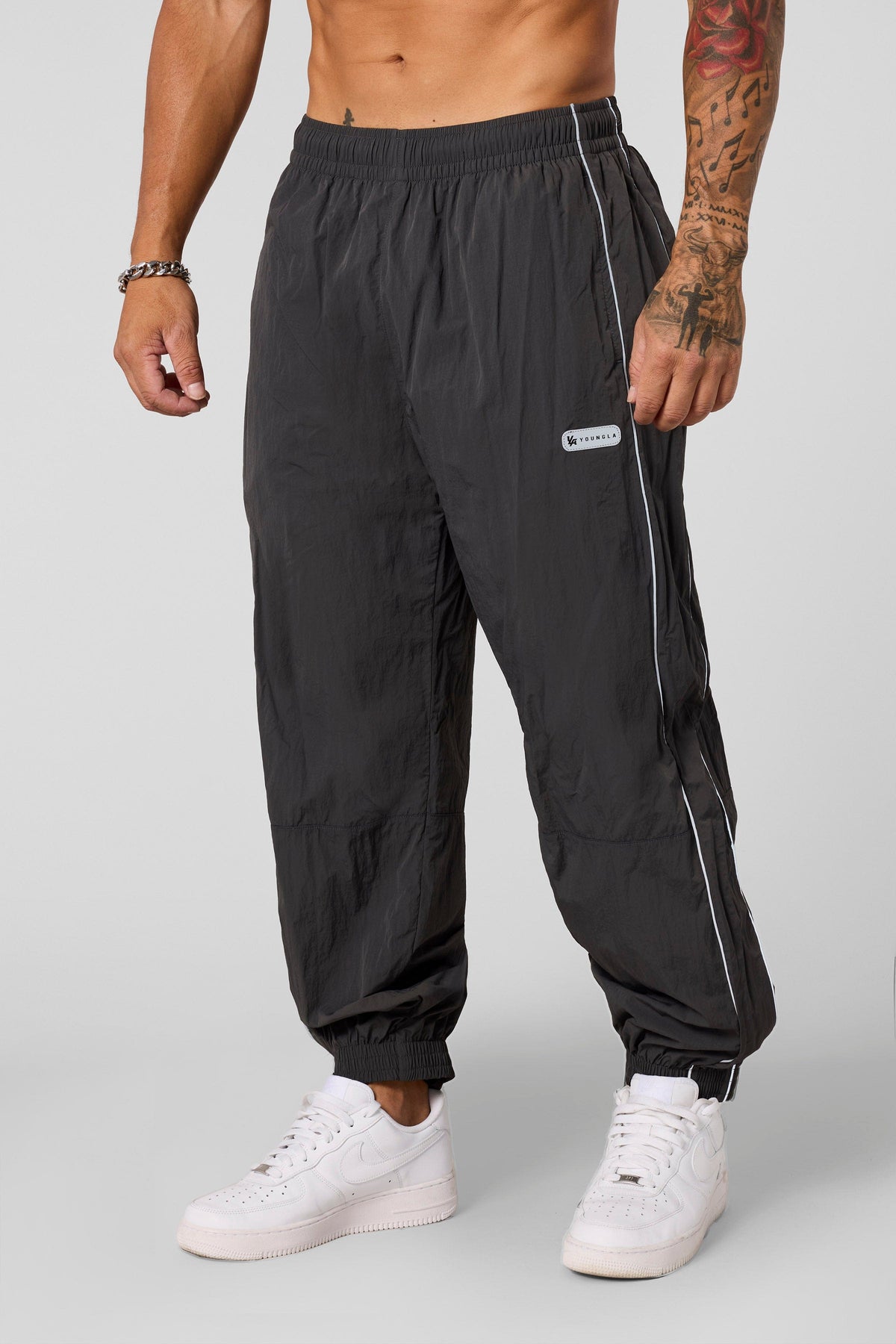 2091 - Retro Cuffed Joggers - Relaxed, lightweight joggers with breathable fabric and cuffed hems. Perfect for training or everyday wear, with a versatile, retro-inspired silhouette in Charcoal.