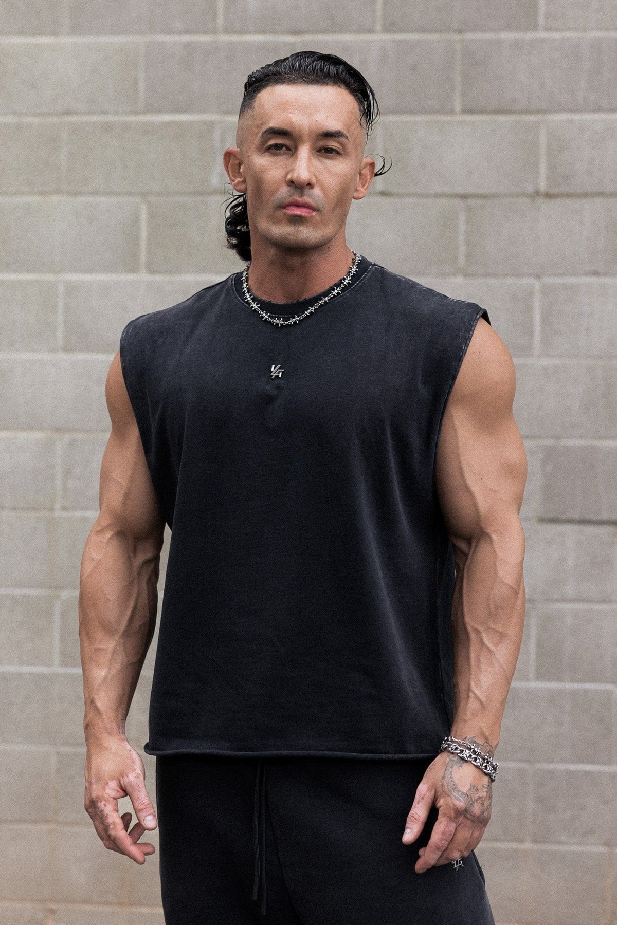 3035 - Elevated Essentials - Cut Offs - Relaxed fleece cut offs with raw-edge hems, lightweight premium cotton, small 'Elevated' logo in colour Black Wash.