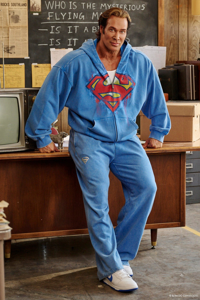 2032 - Superman Sweats - Man of Steel sweatpants from Superman x YoungLA collaboration, acid-wash design, YoungLA chrome logo on left leg, Superman logo on right, baggy fit for comfortable everyday wear in Blue Wash